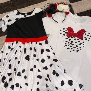 Mommy and mini 101 Dalmatian Disney themed outfits. Light up ears included.